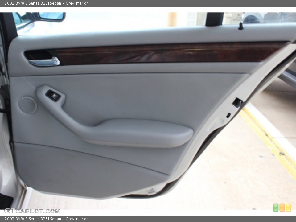 Grey Interior Door Panel for the 2002 BMW 3 Series 325i Sedan #85839088