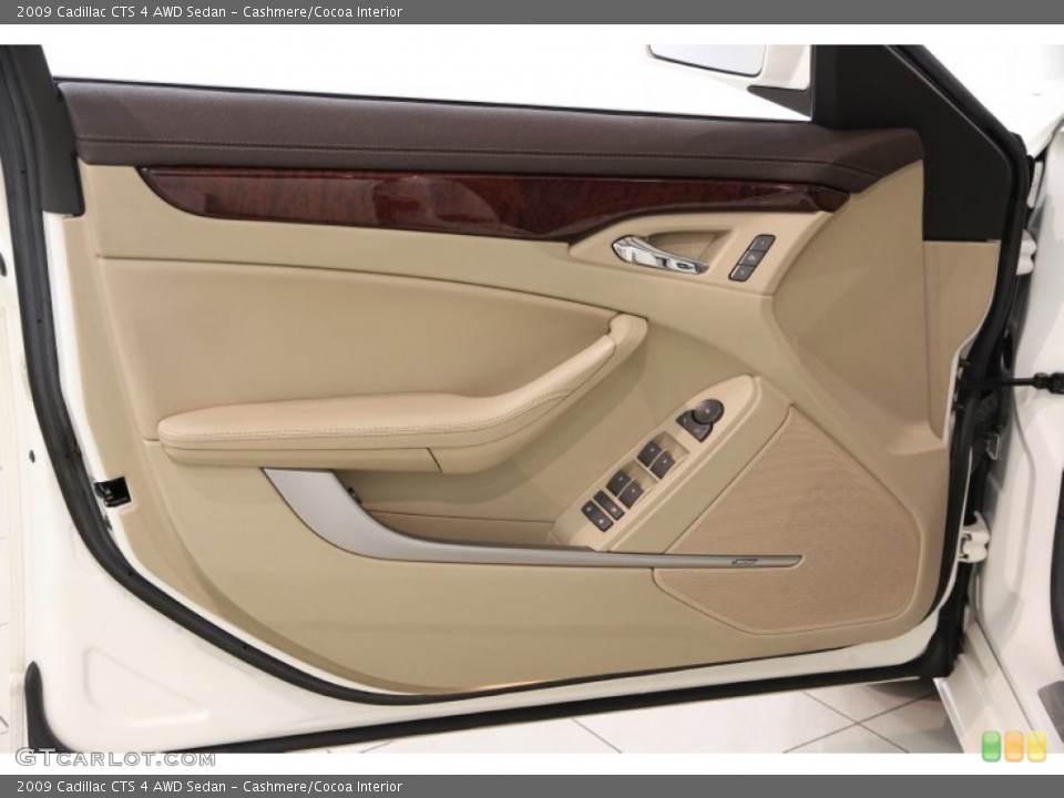 Cashmere/Cocoa Interior Door Panel for the 2009 Cadillac CTS 4 AWD Sedan #85877804