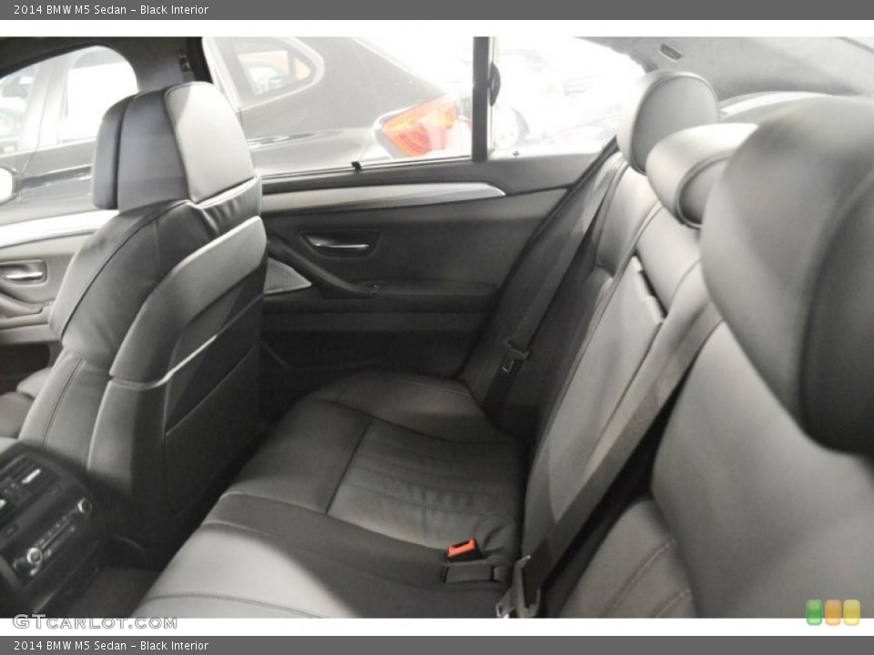 Black Interior Rear Seat for the 2014 BMW M5 Sedan #85937697