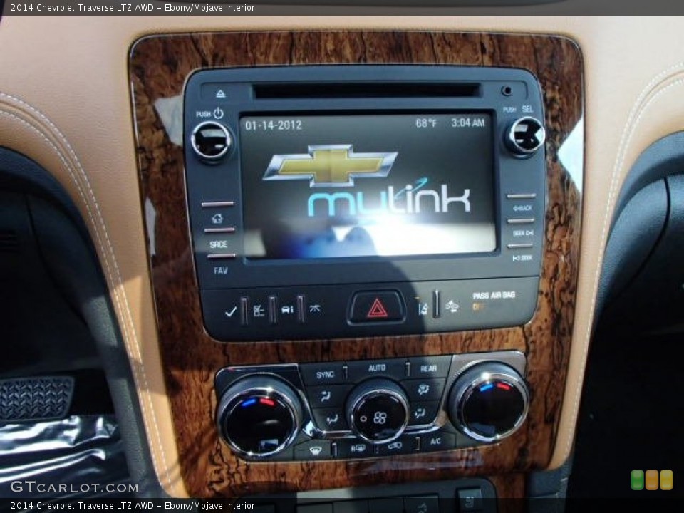 Ebony/Mojave Interior Controls for the 2014 Chevrolet Traverse LTZ AWD #85947933