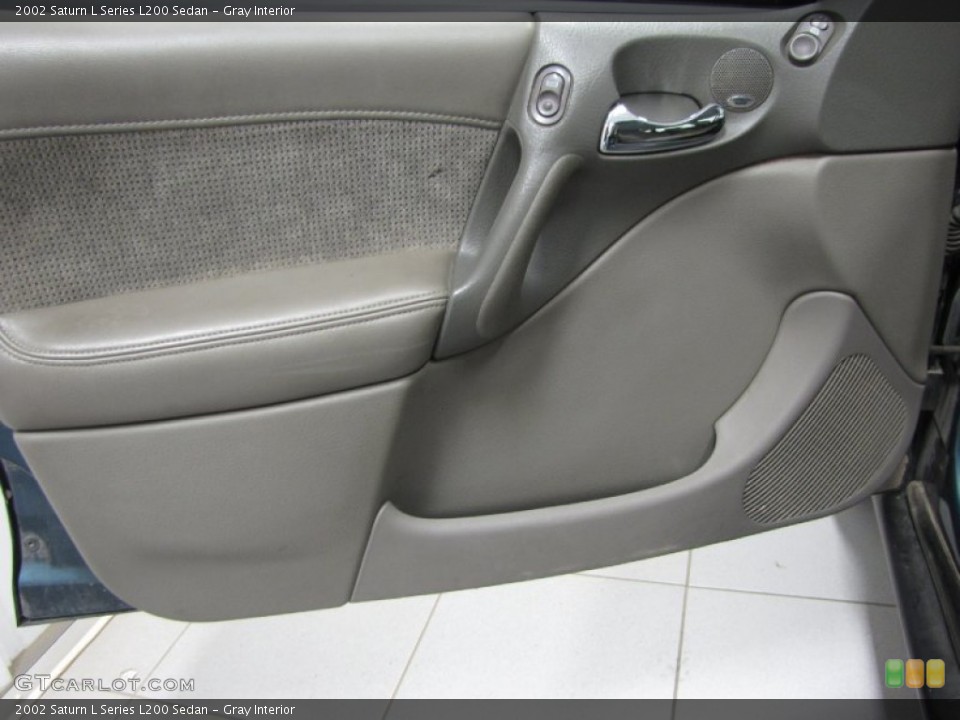 Gray Interior Door Panel for the 2002 Saturn L Series L200 Sedan #85960089