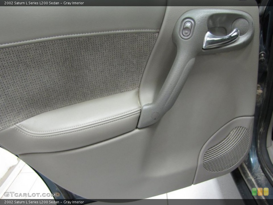 Gray Interior Door Panel for the 2002 Saturn L Series L200 Sedan #85960092