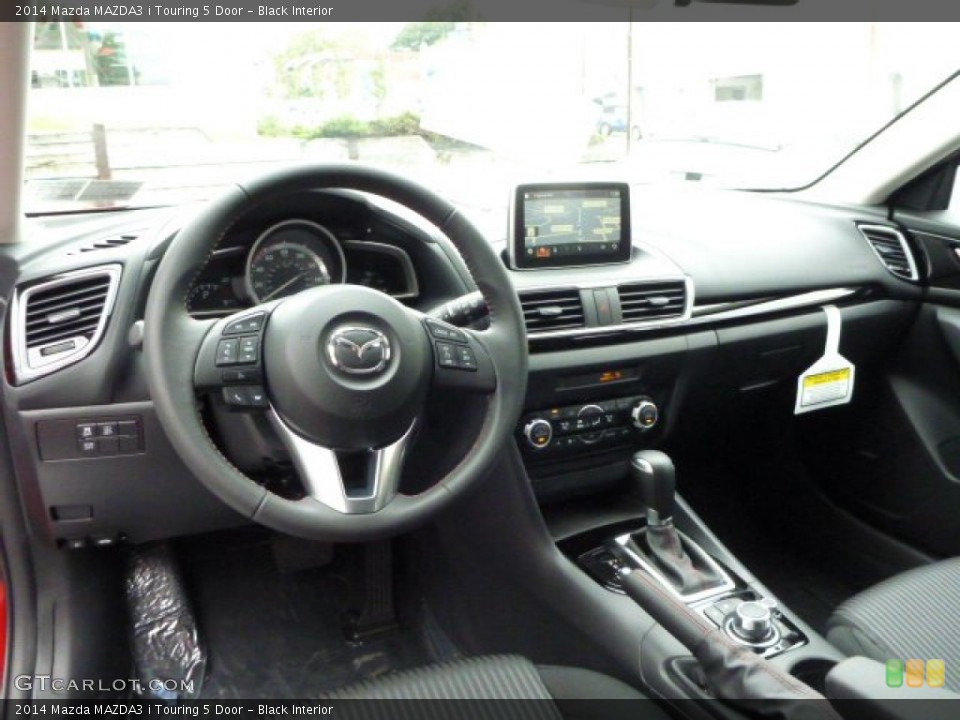 Black Interior Dashboard for the 2014 Mazda MAZDA3 i Touring 5 Door #86080954