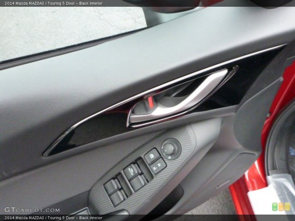 Black Interior Controls for the 2014 Mazda MAZDA3 i Touring 5 Door #86080993