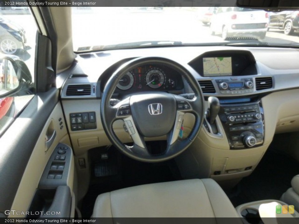 Beige Interior Dashboard for the 2012 Honda Odyssey Touring Elite #86117427