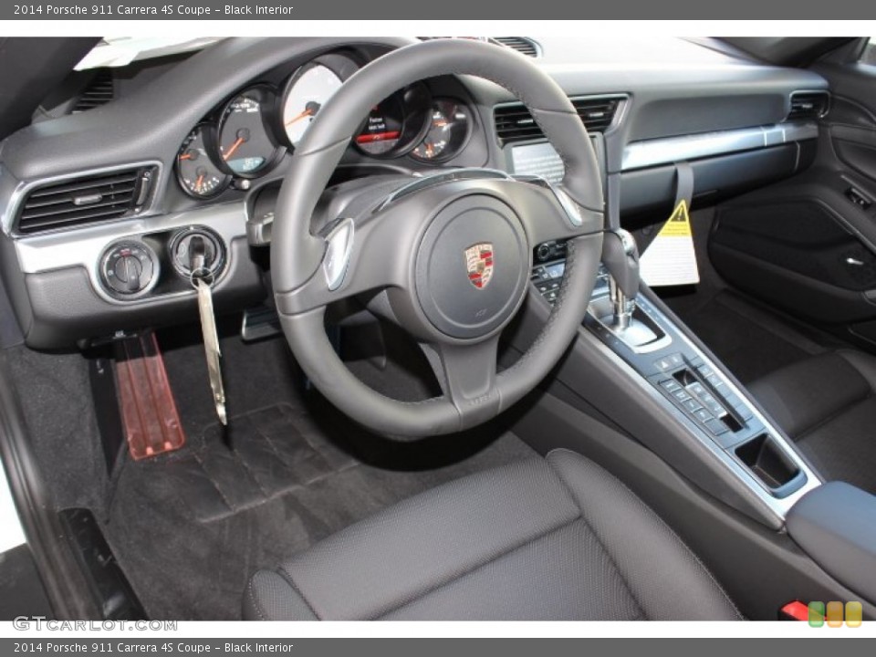Black Interior Prime Interior for the 2014 Porsche 911 Carrera 4S Coupe #86124729