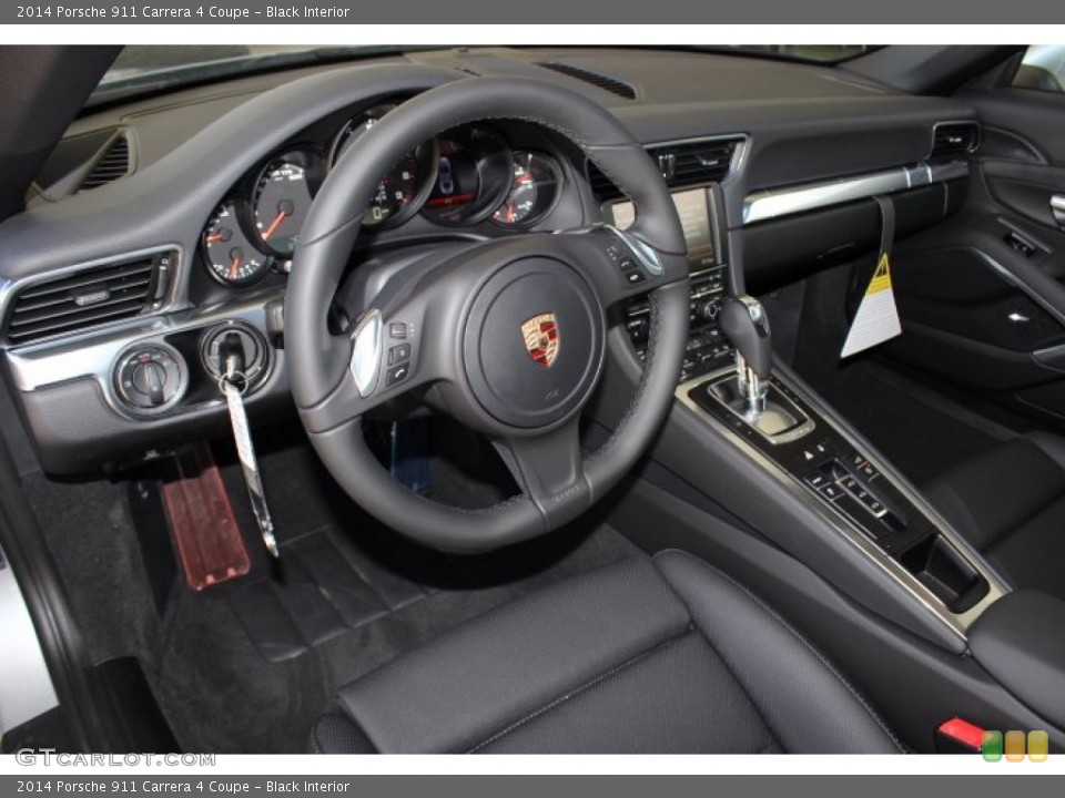 Black Interior Prime Interior for the 2014 Porsche 911 Carrera 4 Coupe #86126193
