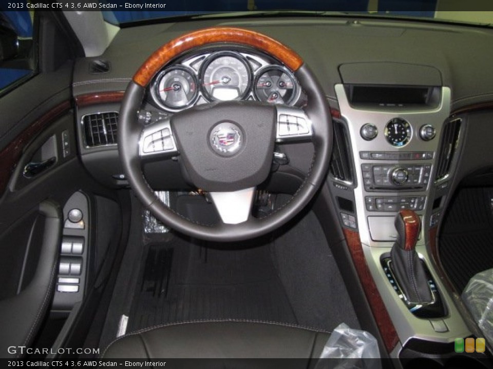 Ebony Interior Dashboard for the 2013 Cadillac CTS 4 3.6 AWD Sedan #86150769
