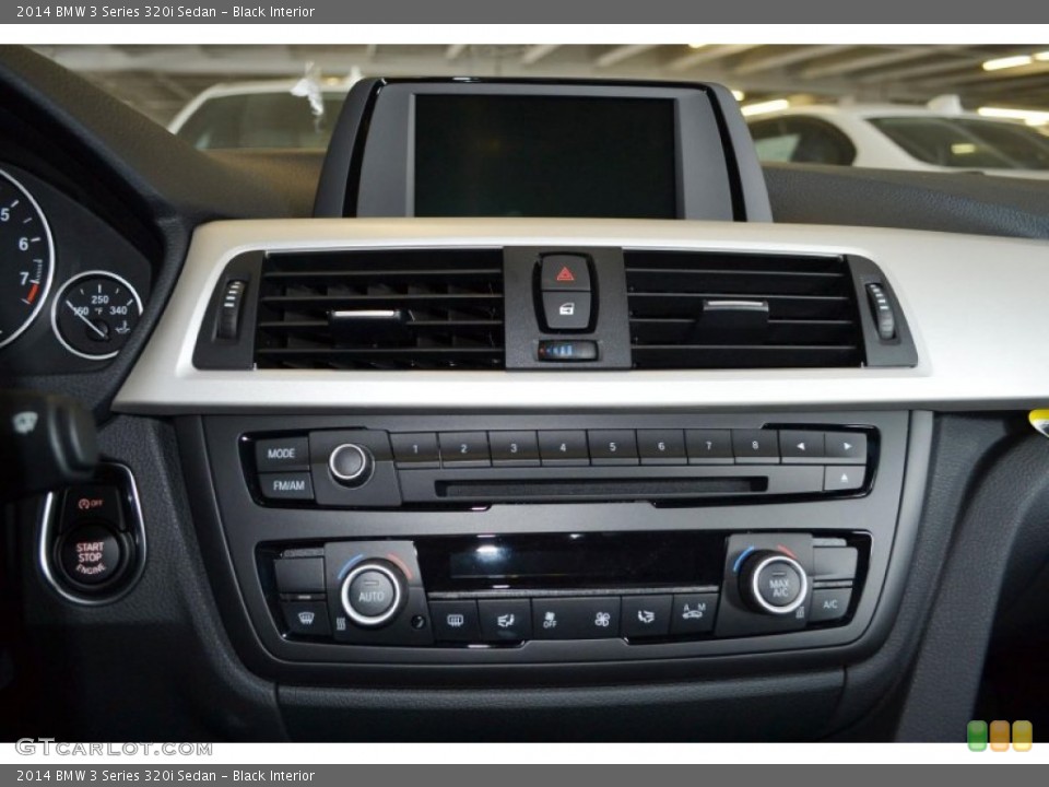 Black Interior Controls for the 2014 BMW 3 Series 320i Sedan #86169283