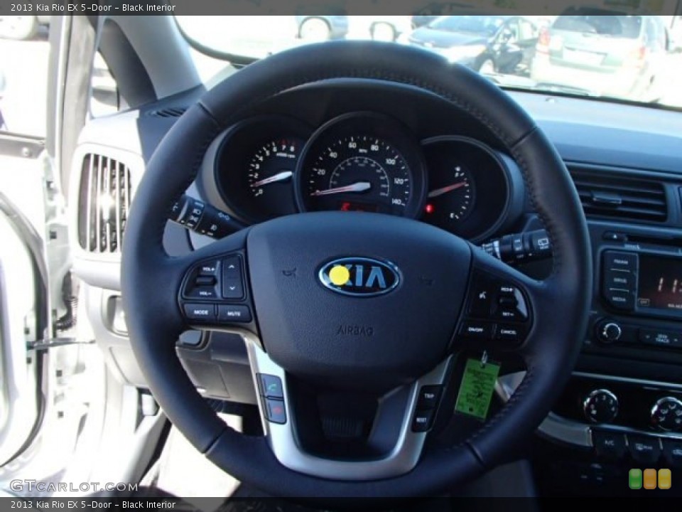 Black Interior Steering Wheel for the 2013 Kia Rio EX 5-Door #86180293