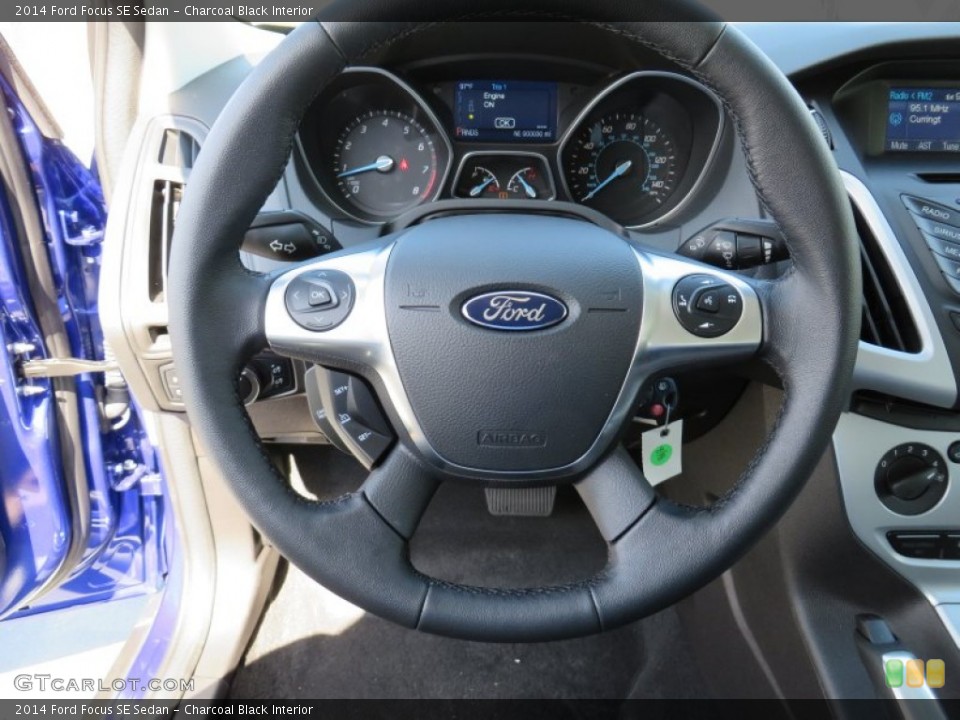 Charcoal Black Interior Steering Wheel for the 2014 Ford Focus SE Sedan #86239340
