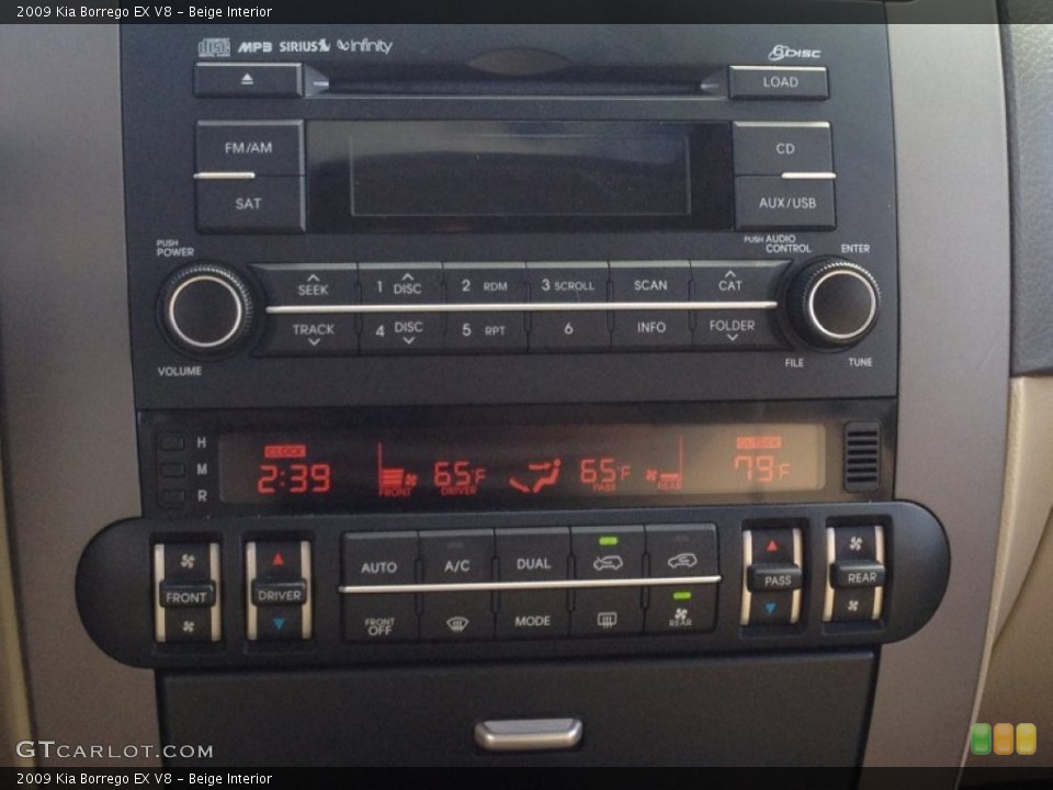 Beige Interior Controls for the 2009 Kia Borrego EX V8 #86286300
