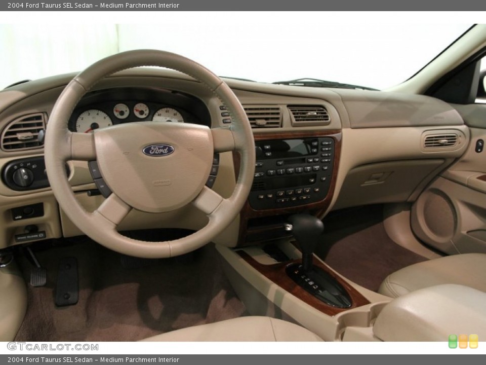 Medium Parchment Interior Dashboard for the 2004 Ford Taurus SEL Sedan #86286876