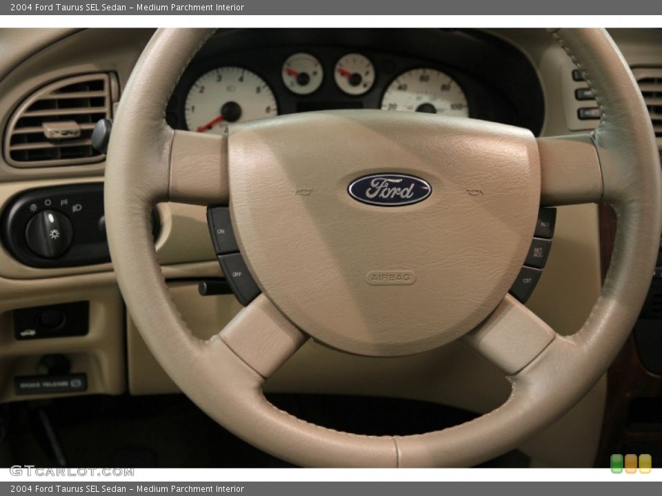 Medium Parchment Interior Steering Wheel for the 2004 Ford Taurus SEL Sedan #86286918