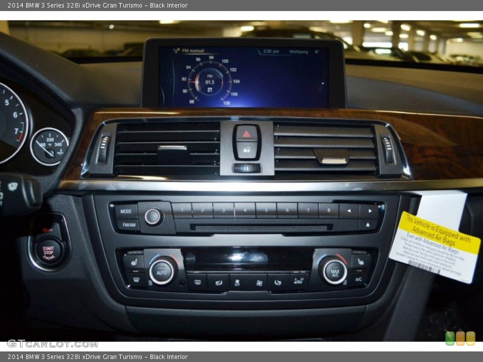 Black Interior Controls for the 2014 BMW 3 Series 328i xDrive Gran Turismo #86341687