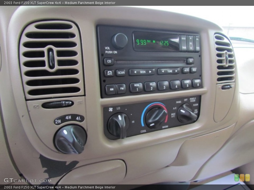 Medium Parchment Beige Interior Controls for the 2003 Ford F150 XLT SuperCrew 4x4 #86382453