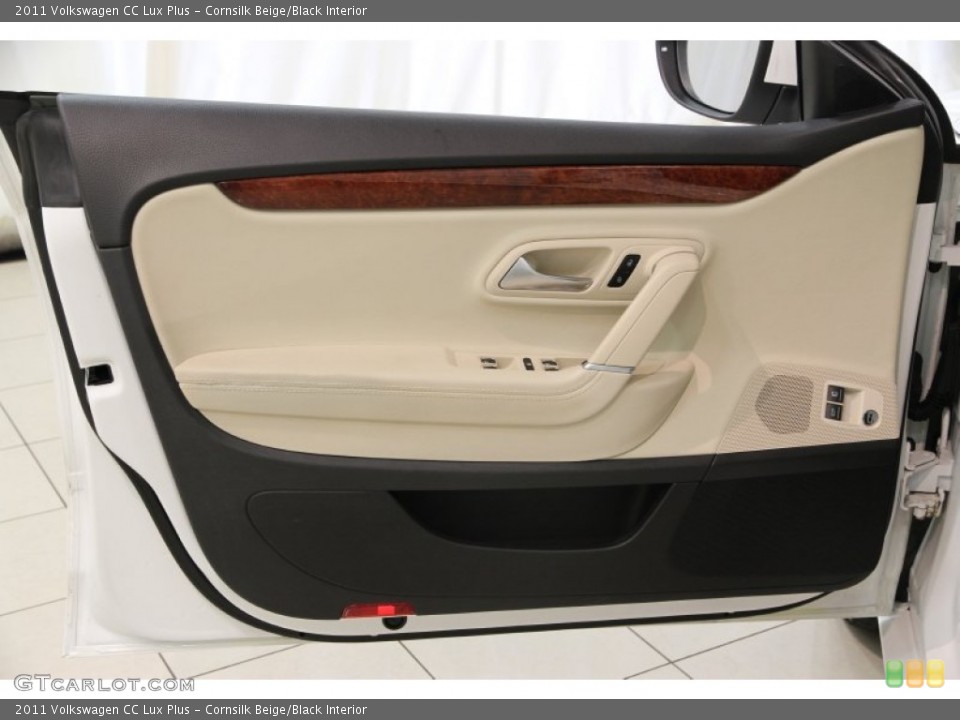 Cornsilk Beige/Black Interior Door Panel for the 2011 Volkswagen CC Lux Plus #86389435