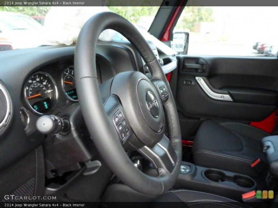 Black Interior Steering Wheel for the 2014 Jeep Wrangler Sahara 4x4 #86391156