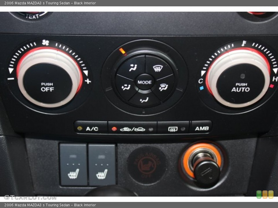 Black Interior Controls for the 2006 Mazda MAZDA3 s Touring Sedan #86400834