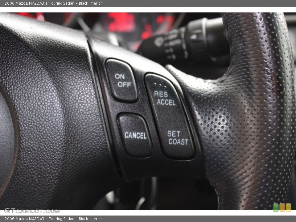 Black Interior Controls for the 2006 Mazda MAZDA3 s Touring Sedan #86400843