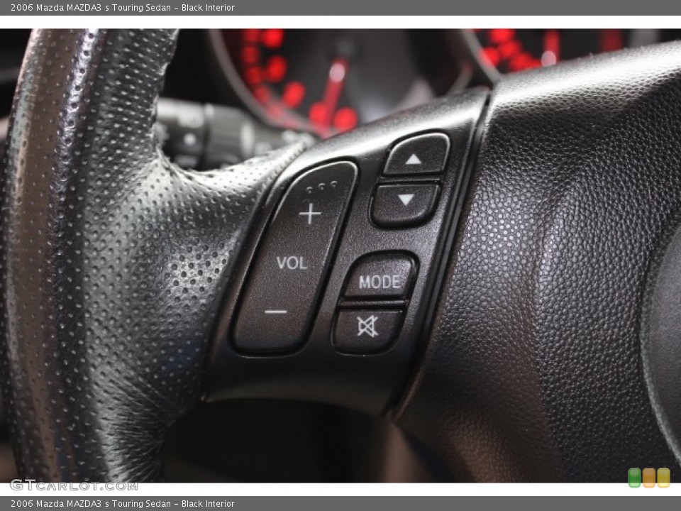 Black Interior Controls for the 2006 Mazda MAZDA3 s Touring Sedan #86400846