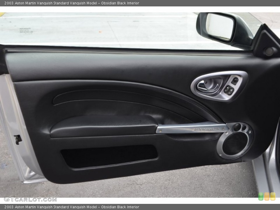 Obsidian Black Interior Door Panel for the 2003 Aston Martin Vanquish  #86443251