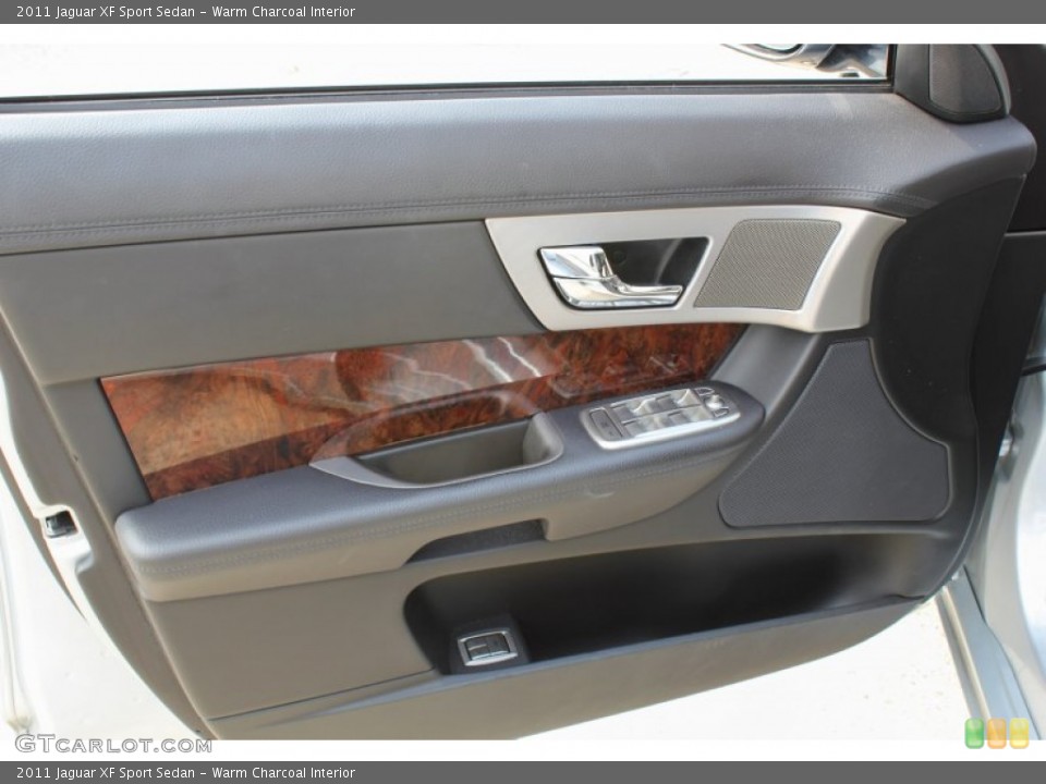 Warm Charcoal Interior Door Panel for the 2011 Jaguar XF Sport Sedan #86473248