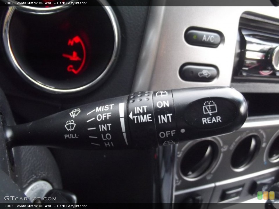 Dark Gray Interior Controls for the 2003 Toyota Matrix XR AWD #86523439