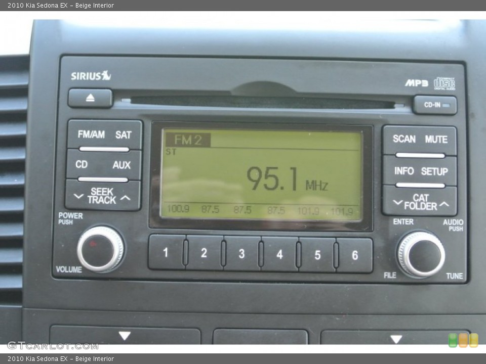 Beige Interior Audio System for the 2010 Kia Sedona EX #86577132