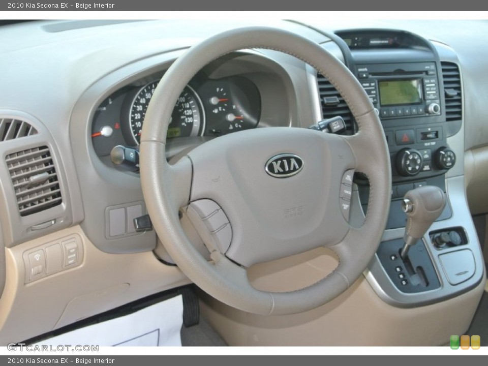 Beige Interior Steering Wheel for the 2010 Kia Sedona EX #86577423