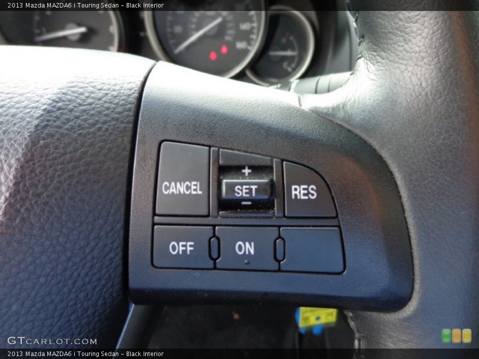 Black Interior Controls for the 2013 Mazda MAZDA6 i Touring Sedan #86648950