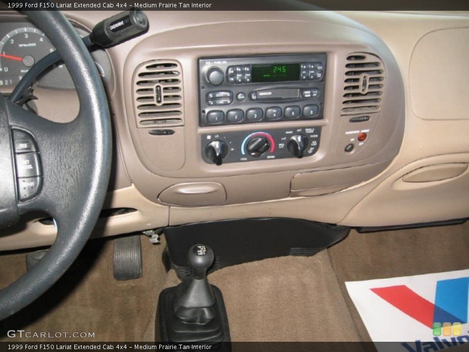 Medium Prairie Tan Interior Controls for the 1999 Ford F150 Lariat Extended Cab 4x4 #86684907