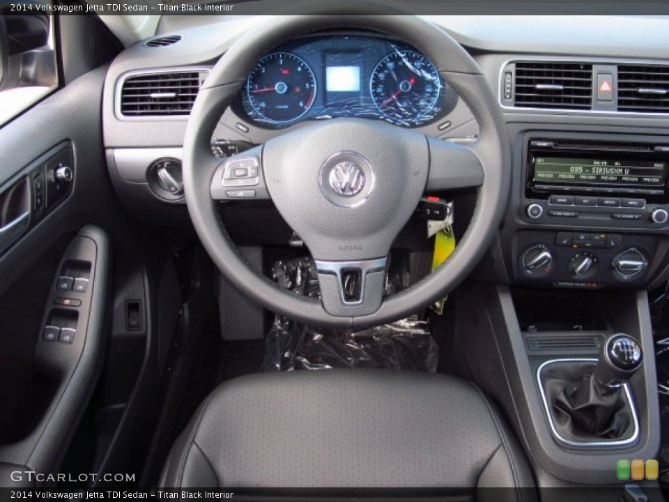 Titan Black Interior Dashboard for the 2014 Volkswagen Jetta TDI Sedan #86713723