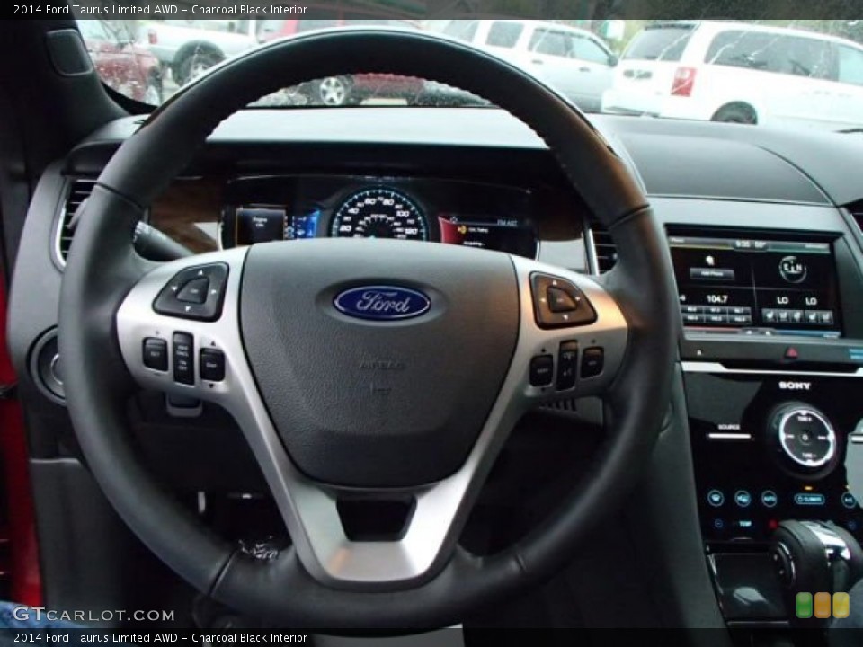 Charcoal Black Interior Steering Wheel for the 2014 Ford Taurus Limited AWD #86836784