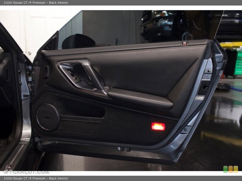 Black Interior Door Panel for the 2009 Nissan GT-R Premium #86838189