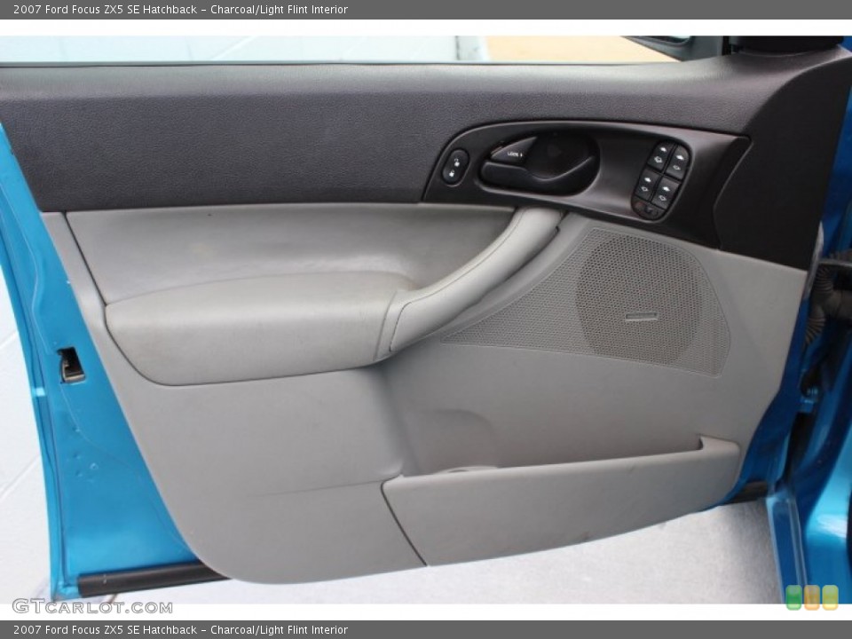 Charcoal/Light Flint Interior Door Panel for the 2007 Ford Focus ZX5 SE Hatchback #86889831