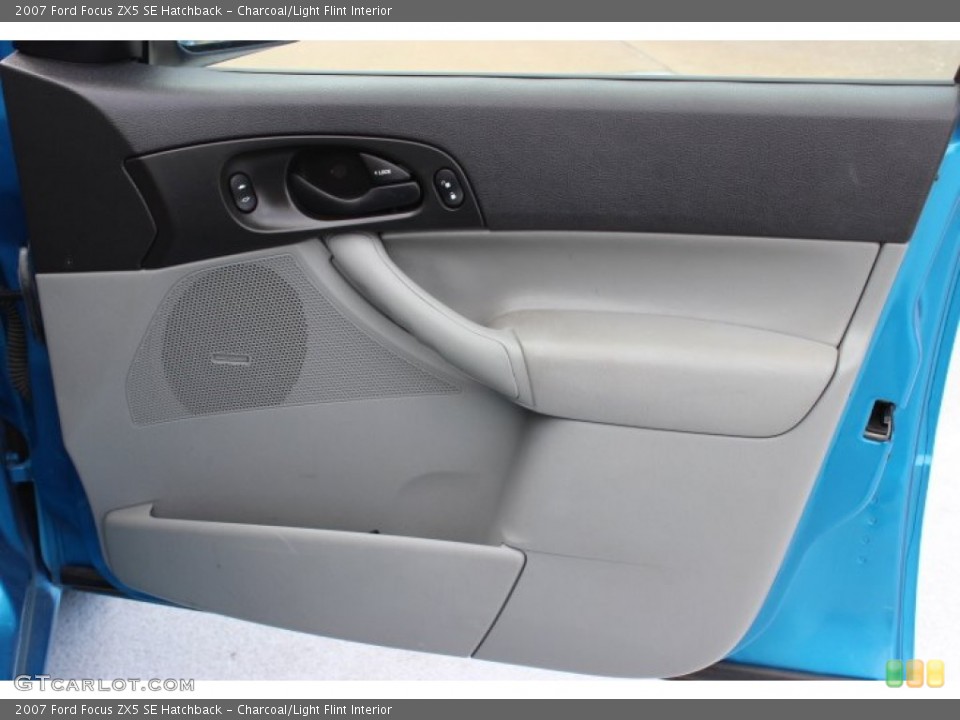 Charcoal/Light Flint Interior Door Panel for the 2007 Ford Focus ZX5 SE Hatchback #86890032