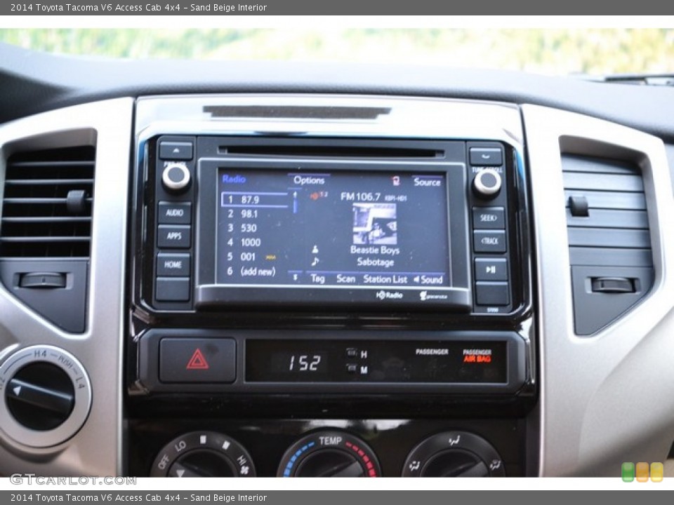 Sand Beige Interior Controls for the 2014 Toyota Tacoma V6 Access Cab 4x4 #86924635