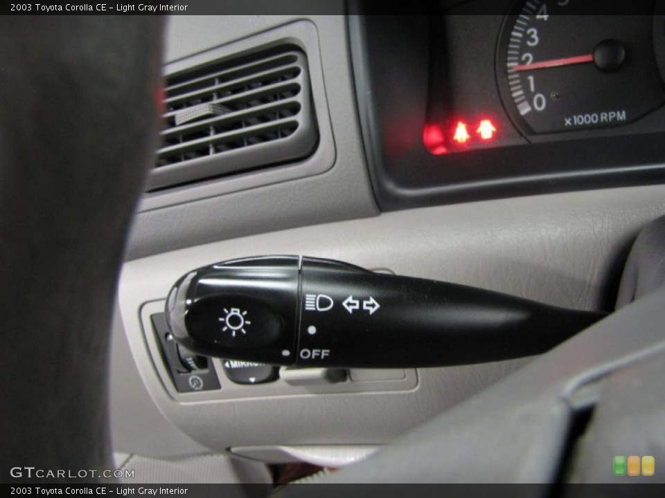Light Gray Interior Controls for the 2003 Toyota Corolla CE #86935933