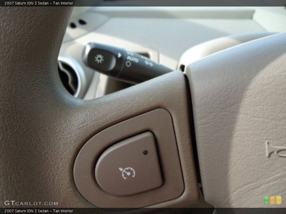 Tan Interior Controls for the 2007 Saturn ION 3 Sedan #87019058