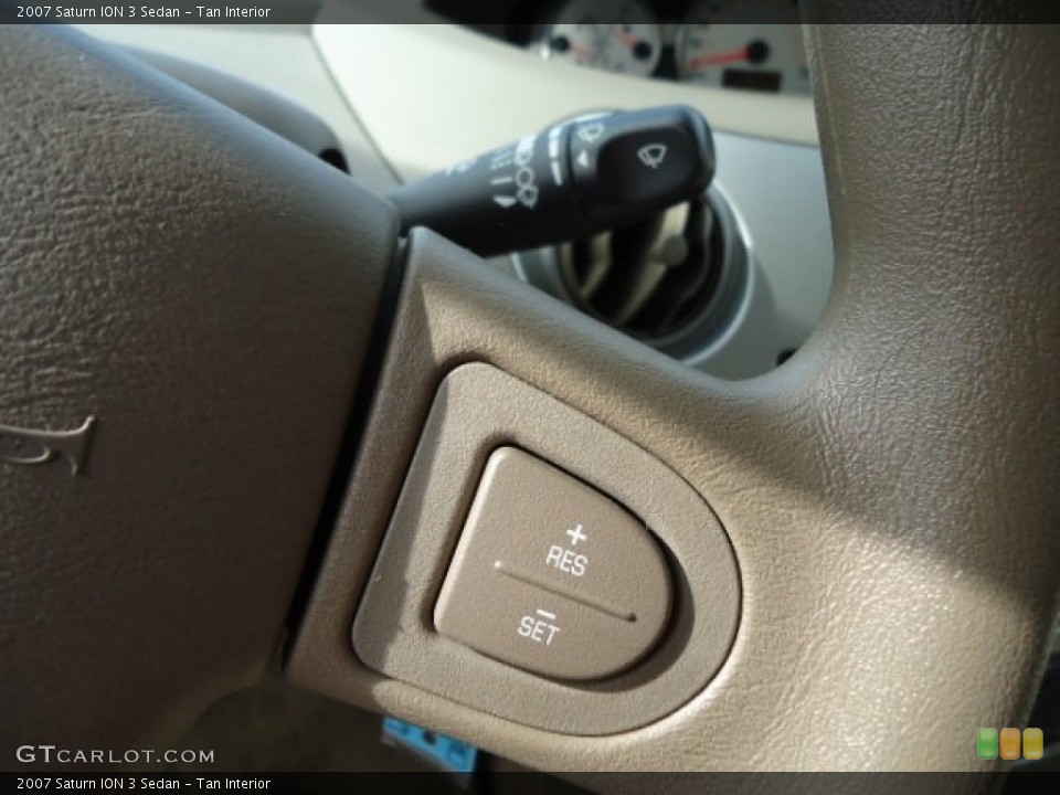 Tan Interior Controls for the 2007 Saturn ION 3 Sedan #87019079