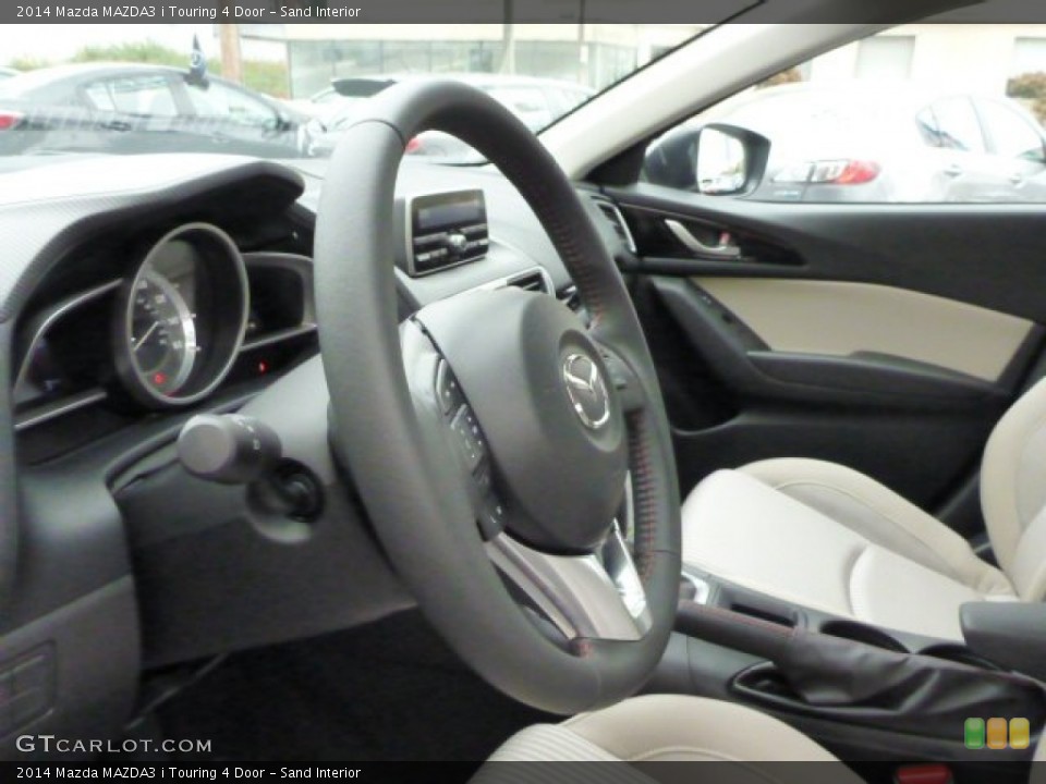 Sand Interior Steering Wheel for the 2014 Mazda MAZDA3 i Touring 4 Door #87024959