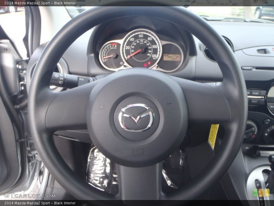 Black Interior Steering Wheel for the 2014 Mazda Mazda2 Sport #87066543