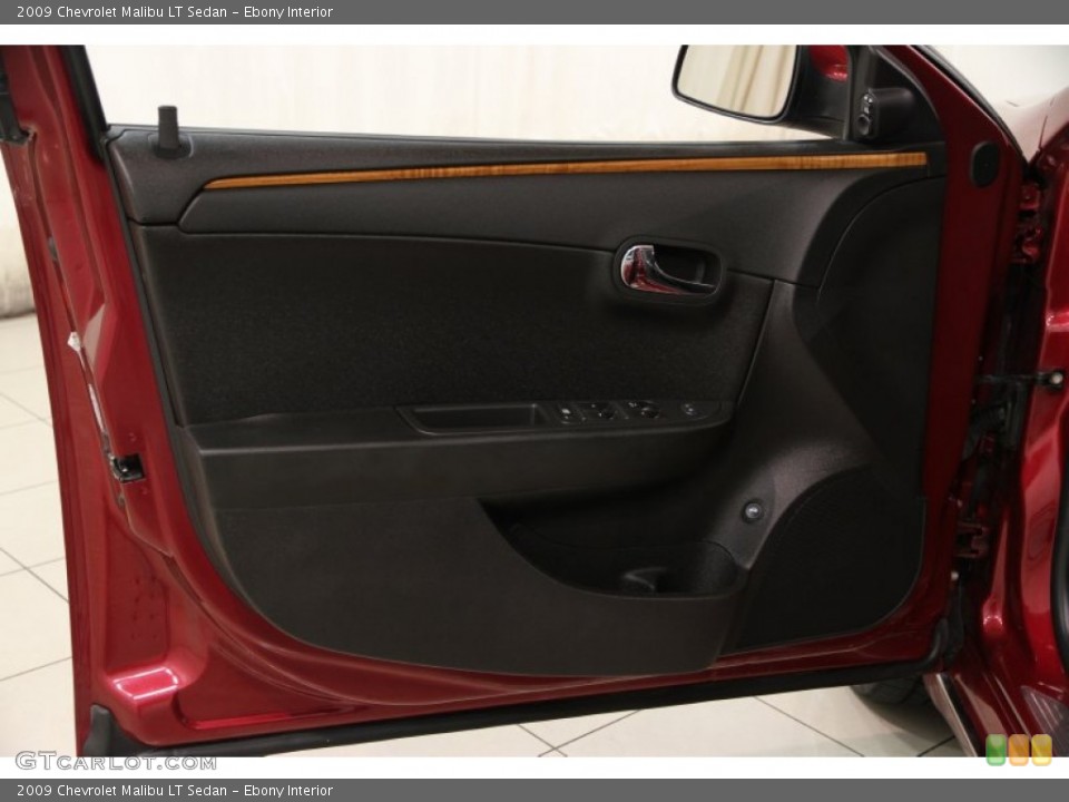 Ebony Interior Door Panel for the 2009 Chevrolet Malibu LT Sedan #87090723