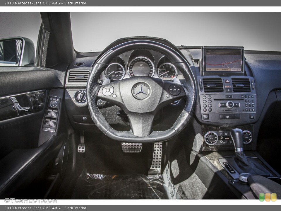 Black Interior Dashboard for the 2010 Mercedes-Benz C 63 AMG #87132180