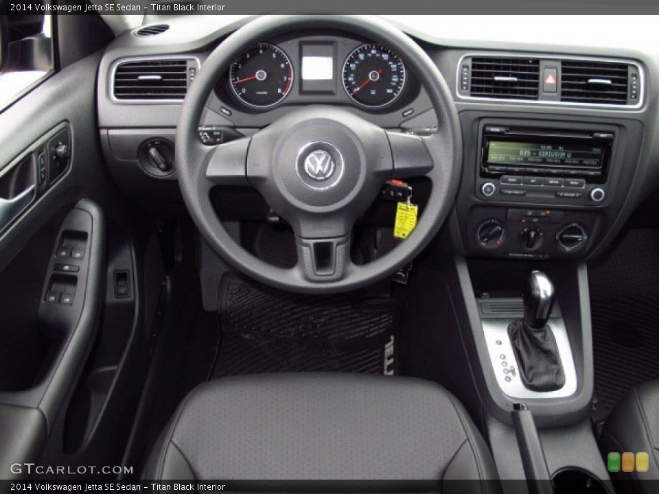 Titan Black Interior Dashboard for the 2014 Volkswagen Jetta SE Sedan #87210267