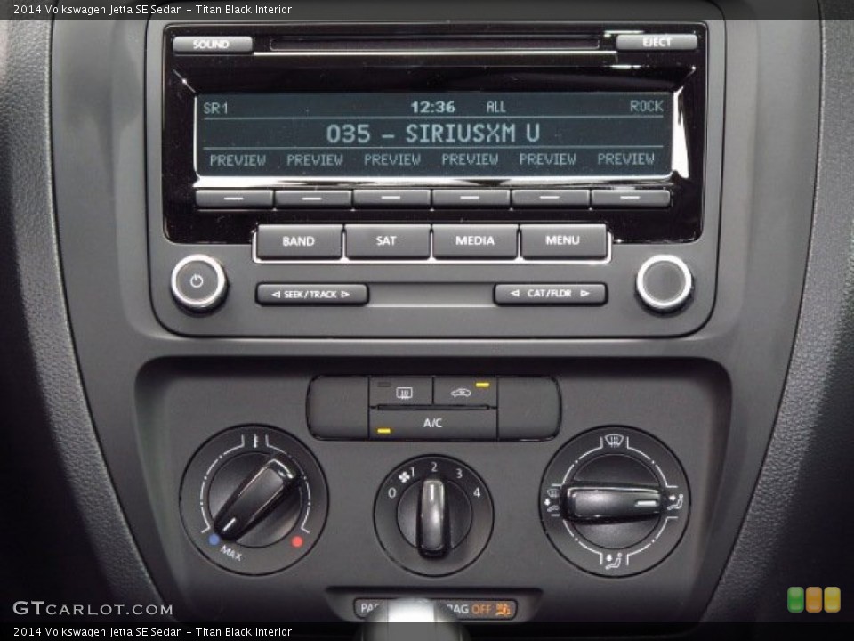Titan Black Interior Controls for the 2014 Volkswagen Jetta SE Sedan #87210402
