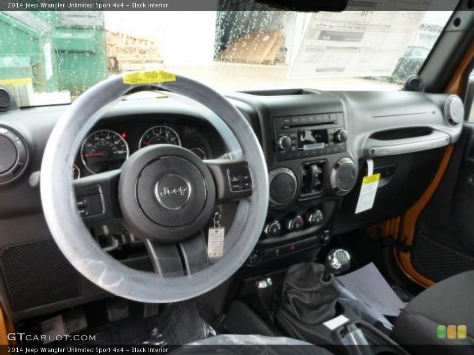 Black Interior Dashboard for the 2014 Jeep Wrangler Unlimited Sport 4x4 #87223359