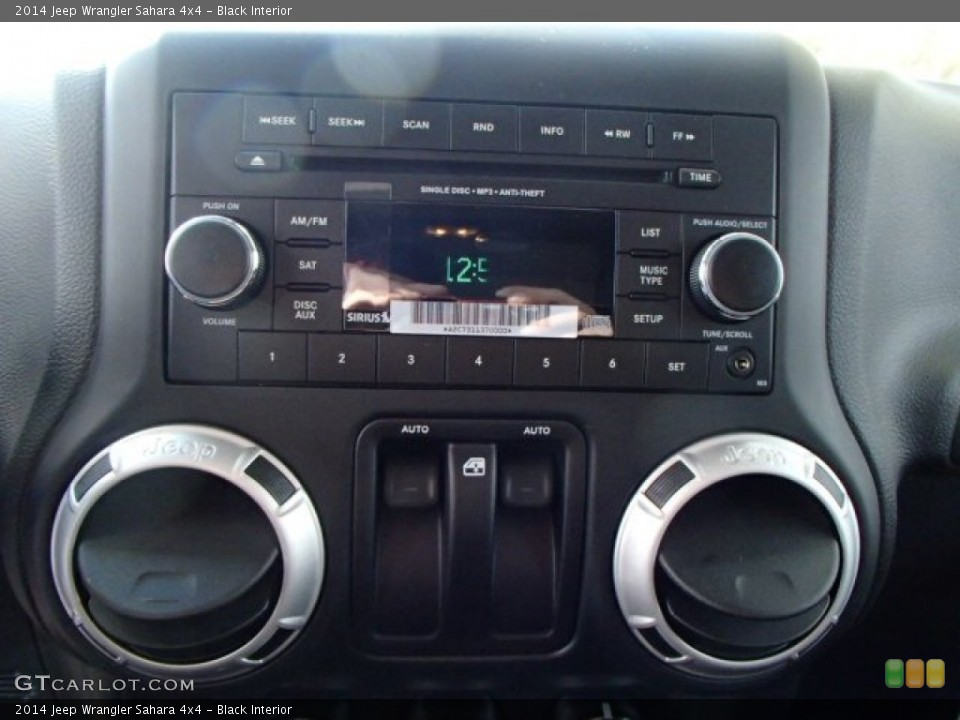 Black Interior Audio System for the 2014 Jeep Wrangler Sahara 4x4 #87238059