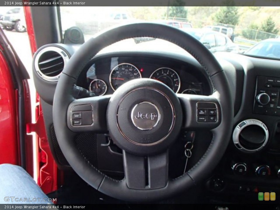 Black Interior Steering Wheel for the 2014 Jeep Wrangler Sahara 4x4 #87238149